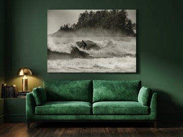 Stretched canvas wall art styled on the wall in a moody living room