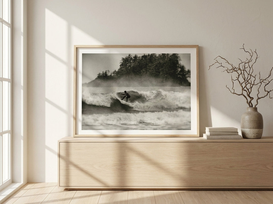 Modern wall art print standing on a sideboard in a warm Japandi bedroom