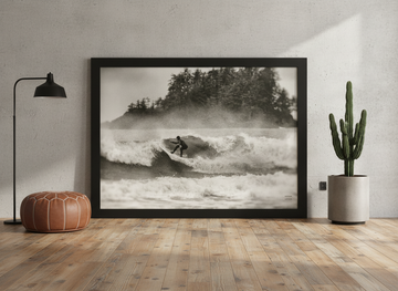 Oversized statement modern wall art print leaning against the wall in an industrial loft living room