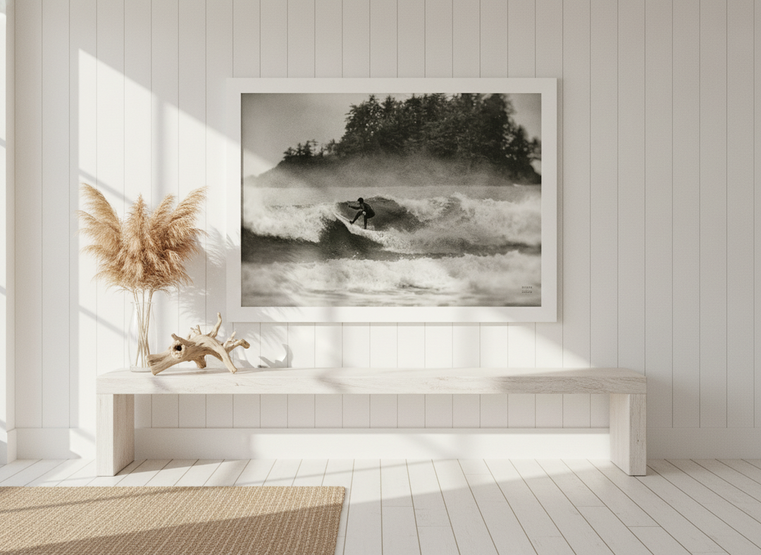 Modern wall art print standing on a console in a coastal dining room