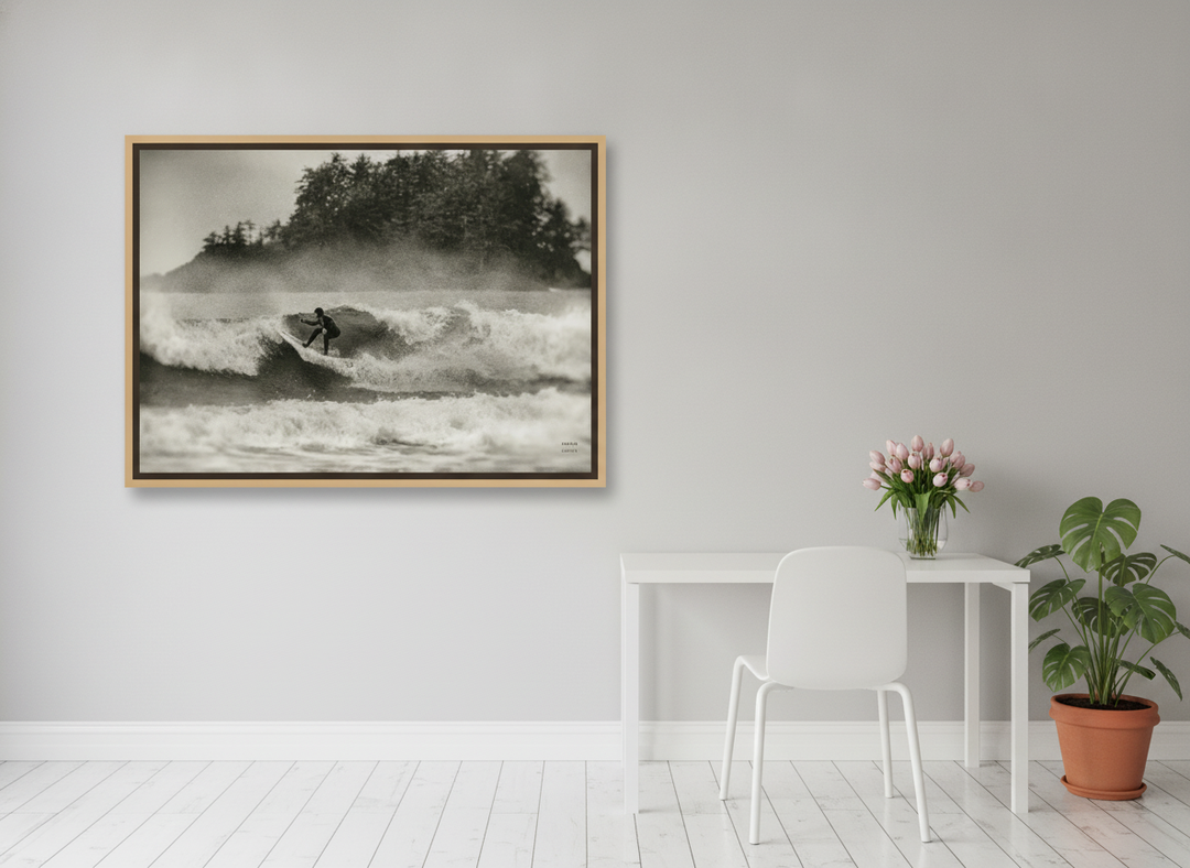 Canvas wall art with a natural timber surround styled on the wall in a bright Scandinavian home office