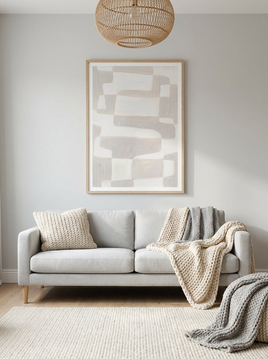 Modern wall art print styled on the wall in a bright Scandinavian living room