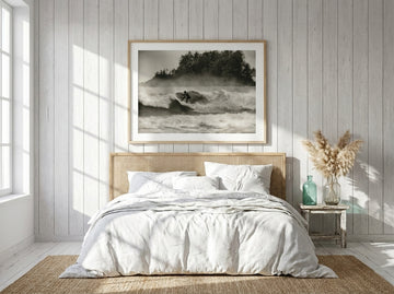 Modern wall art print styled on the wall in a coastal bedroom