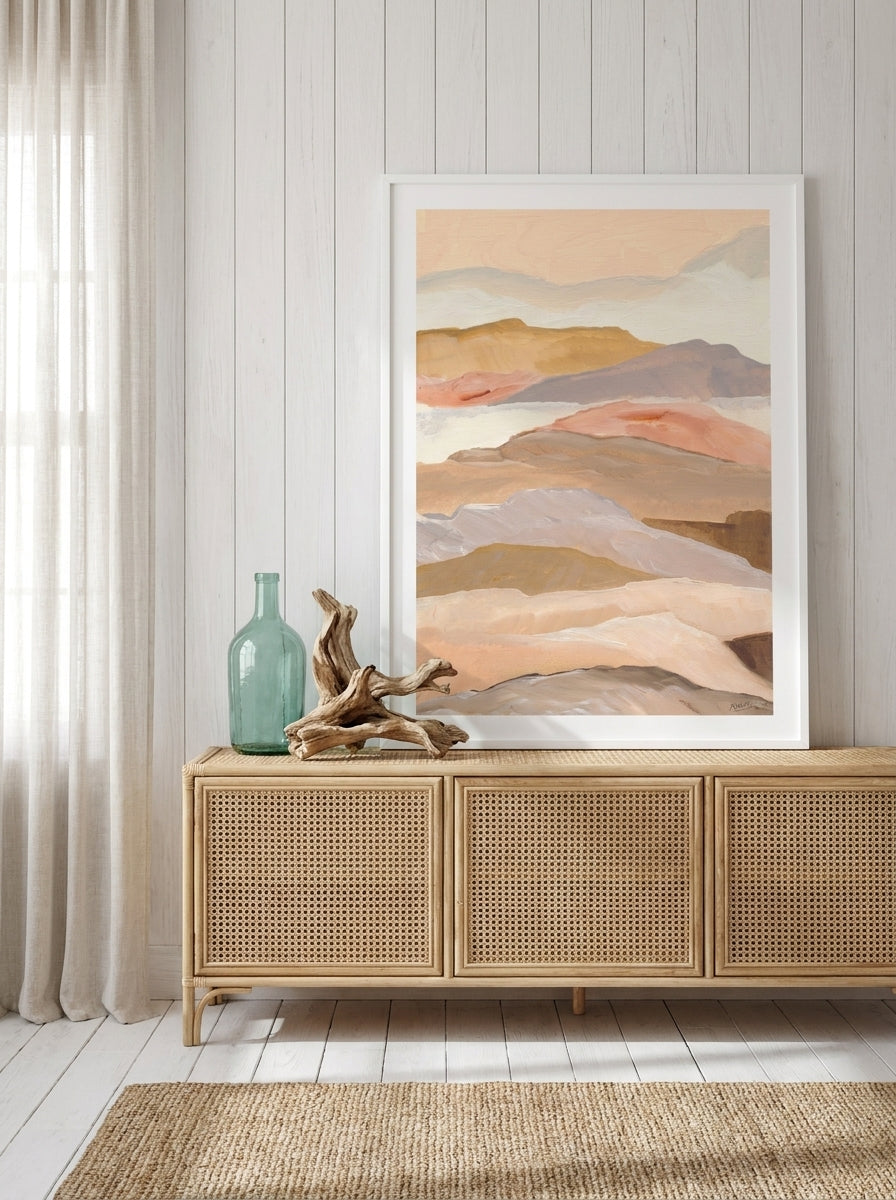 Modern wall art print standing on a sideboard in a coastal home office