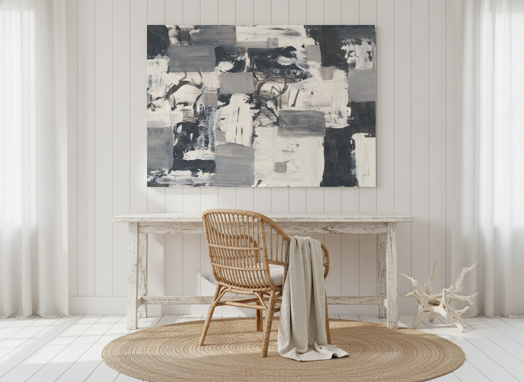 Stretched canvas wall art styled on the wall in a coastal home office