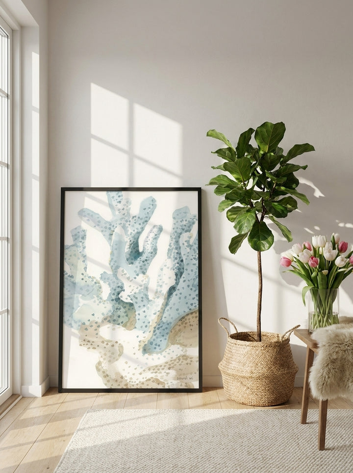 Modern wall art print leaning against the wall in a bright Scandinavian bathroom