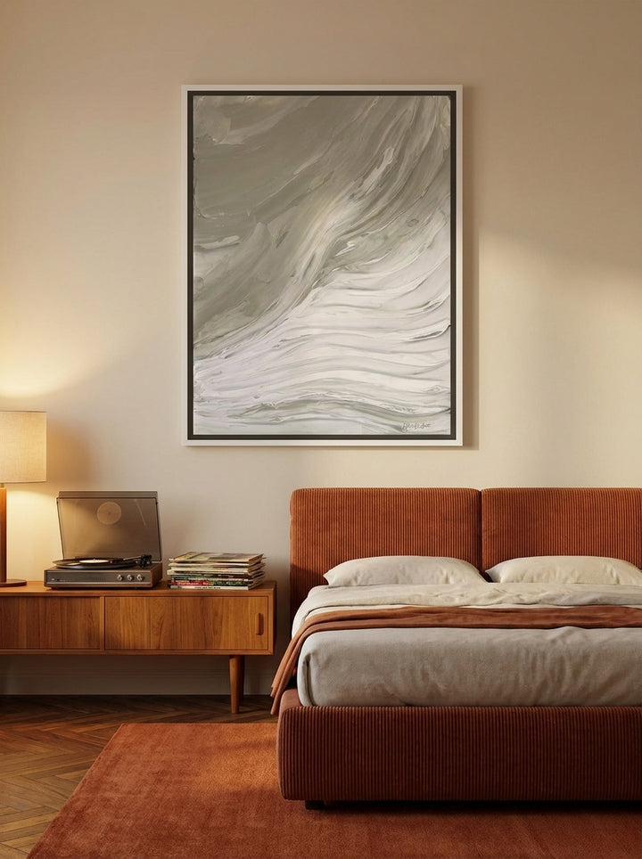 Canvas wall art with a white surround styled on the wall in a retro 70s bedroom