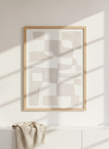 Modern wall art print styled on the wall in a bright Scandinavian living room