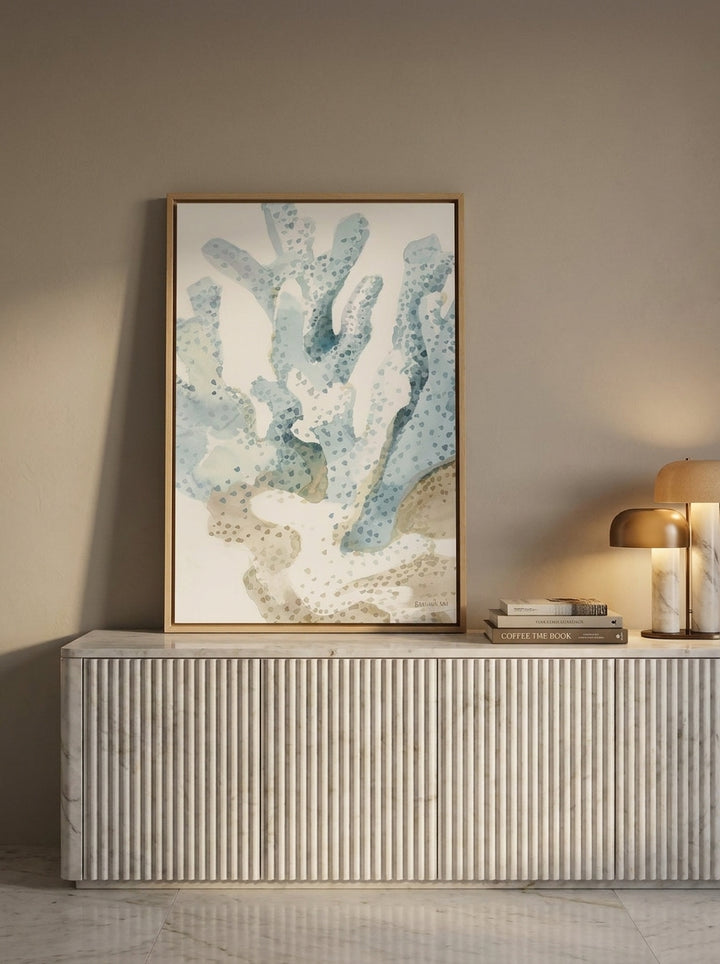 Canvas wall art with a natural timber surround standing on a sideboard in a luxe bathroom