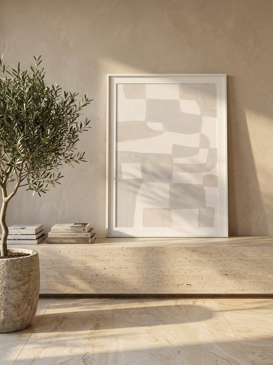 Modern wall art print standing on a console in a luxe home office