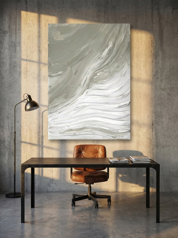 Stretched canvas wall art styled on the wall in an industrial loft home office