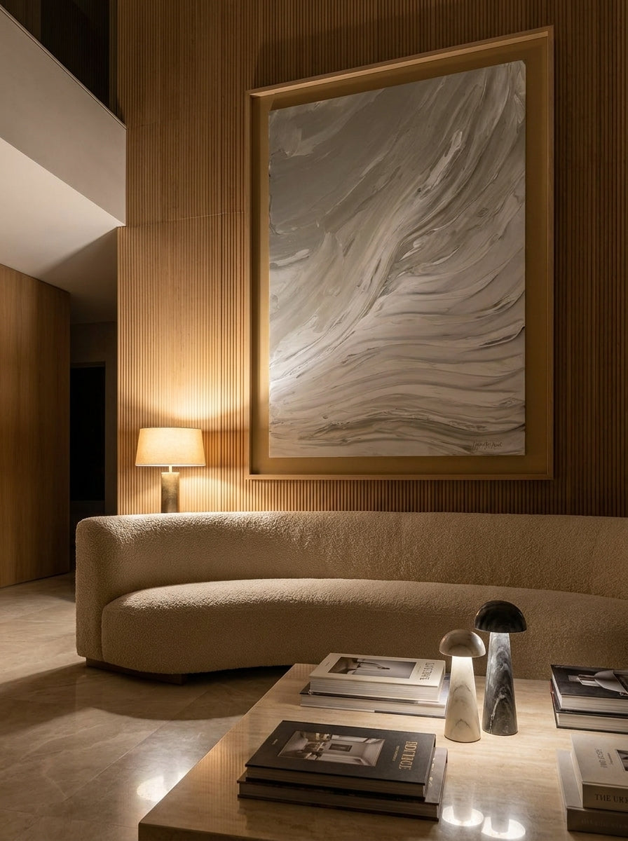Oversized statement modern wall art print styled on the wall in a luxe living room