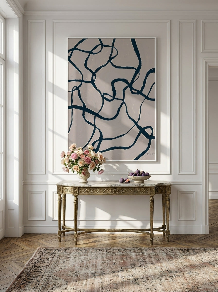 Oversized statement modern wall art print styled on the wall in a Parisian living room