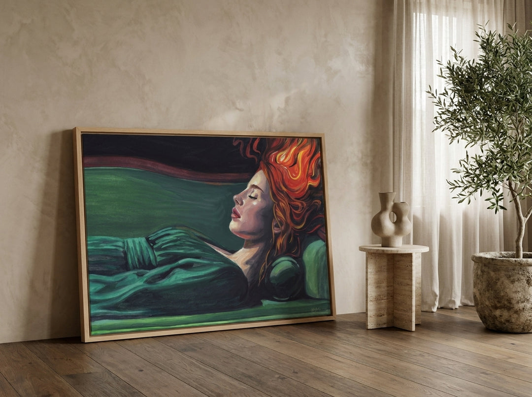 Oversized statement canvas wall art with a natural timber surround leaning against the wall in a luxe living room
