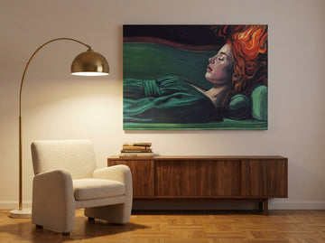 Stretched canvas wall art styled on the wall in a mid-century living room