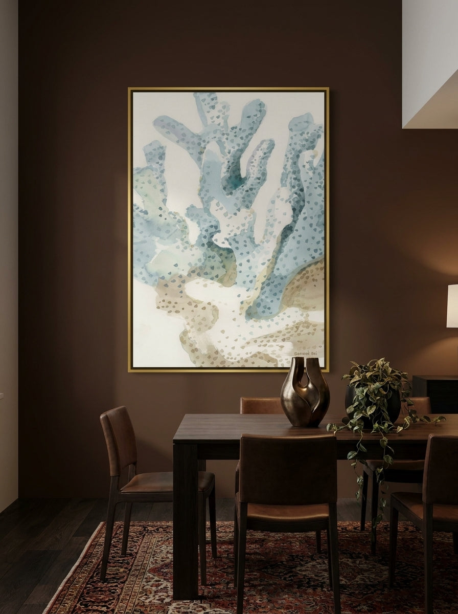 Oversized statement canvas wall art with a gold leaf surround styled on the wall in a moody dining room