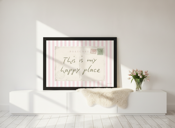 Modern wall art print standing on a sideboard in a bright Scandinavian bedroom