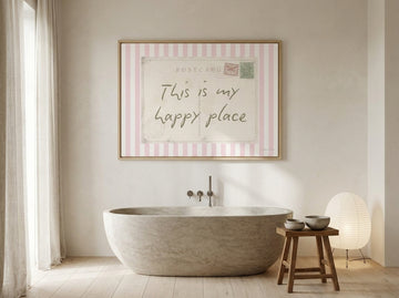 Modern wall art print styled on the wall in a warm Japandi bathroom