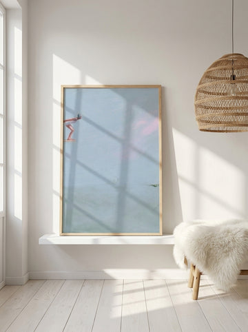 Modern wall art print standing on a shelf in a bright Scandinavian bathroom