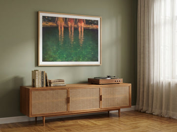 Modern wall art print styled on the wall in a mid-century living room