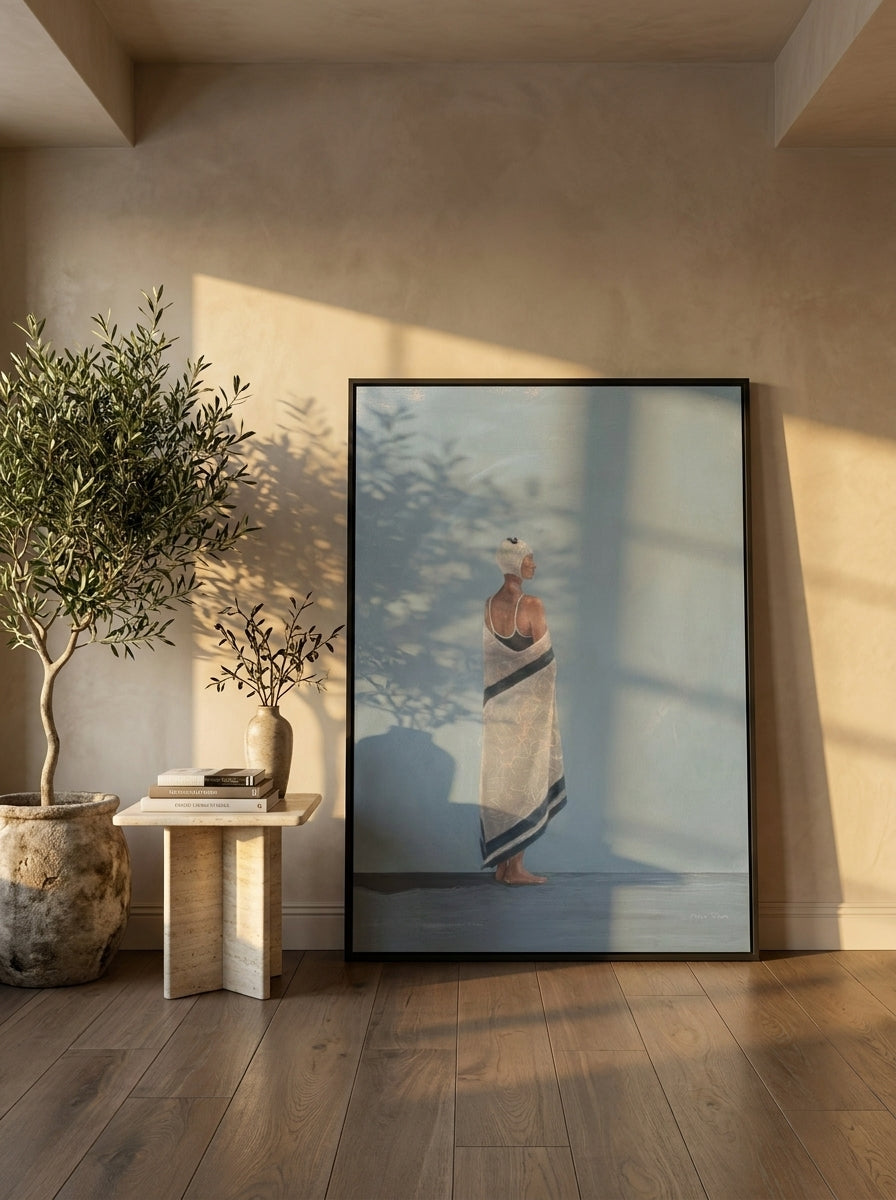 Oversized statement modern wall art print leaning against the wall in a luxe dining room