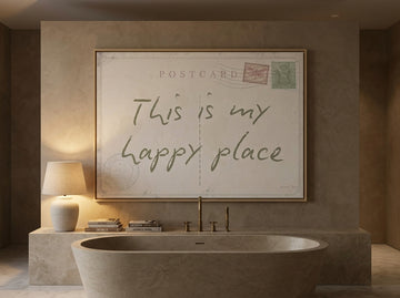 Oversized statement canvas wall art with a natural timber surround styled on the wall in a luxe bathroom