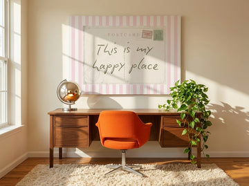 Stretched canvas wall art styled on the wall in a retro 70s home office