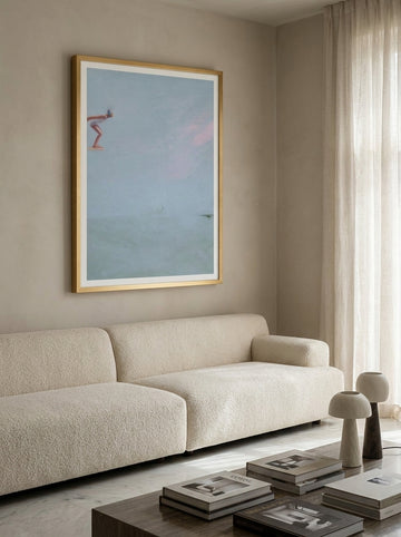 Modern wall art print styled on the wall in a luxe living room