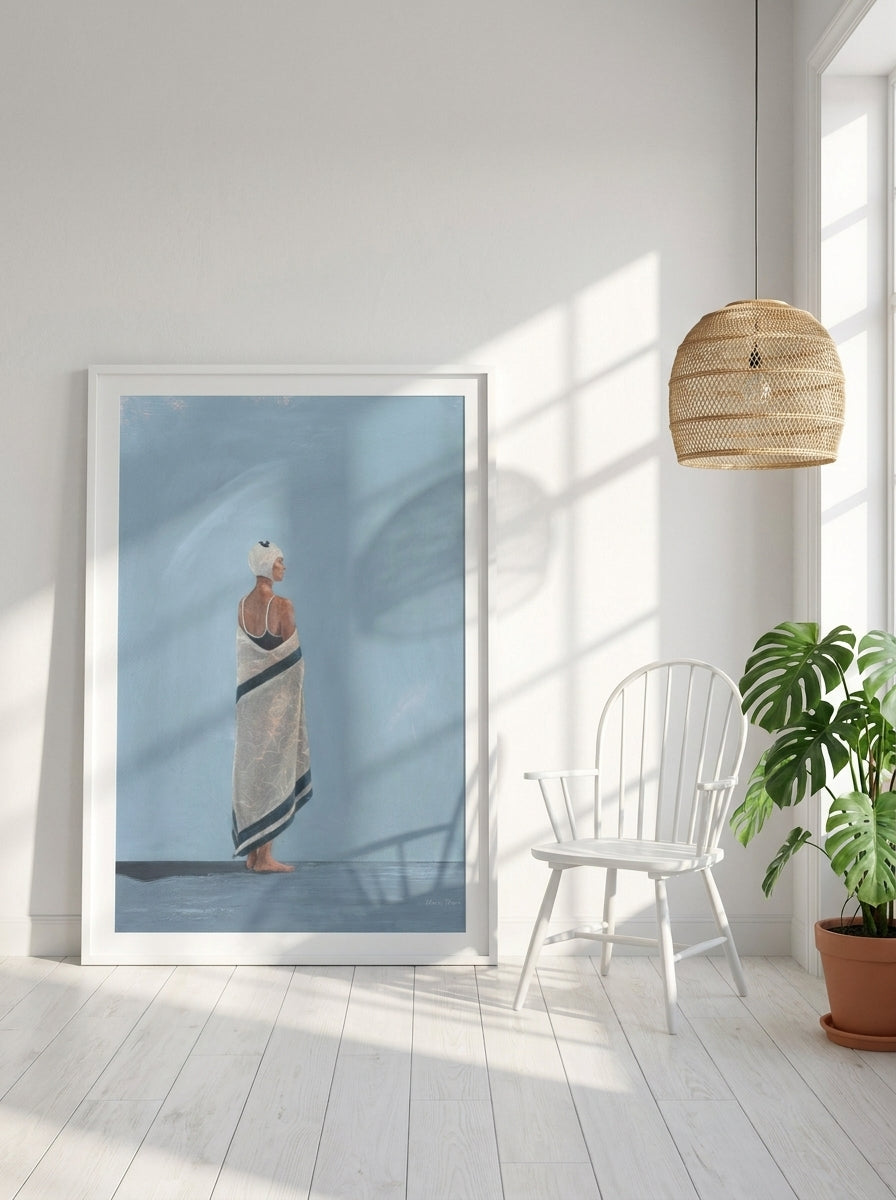 Oversized statement modern wall art print leaning against the wall in a bright Scandinavian living room