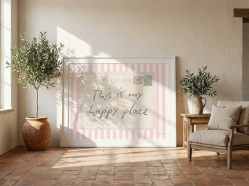 Oversized statement modern wall art print leaning against the wall in a Mediterranean living room
