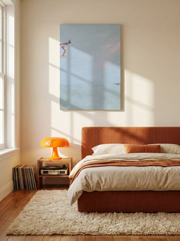 Stretched canvas wall art styled on the wall in a retro 70s bedroom