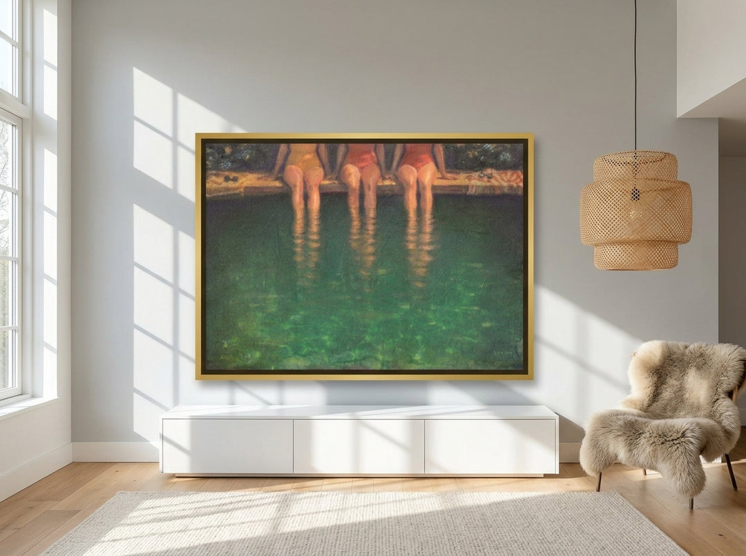 Oversized statement canvas wall art with a gold leaf surround styled on the wall in a bright Scandinavian living room