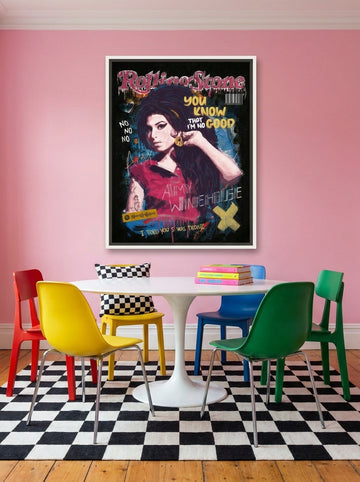 Canvas wall art with a white surround styled on the wall in a colourful eclectic dining room
