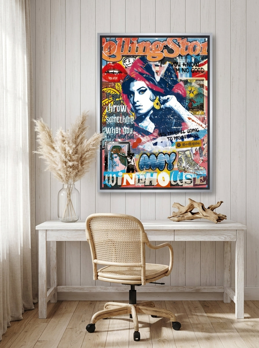 Canvas wall art with a silver leaf surround styled on the wall in a coastal home office
