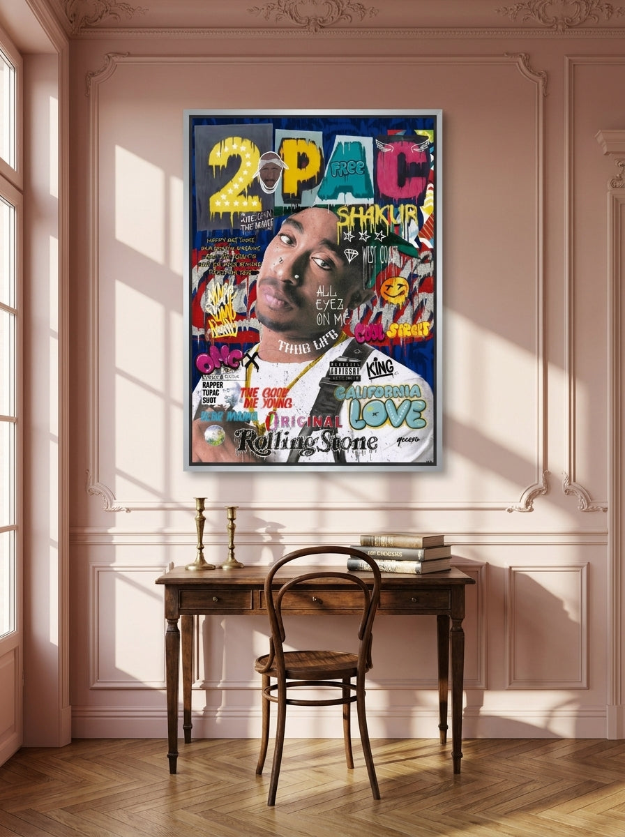 Canvas wall art with a silver leaf surround styled on the wall in a Parisian home office