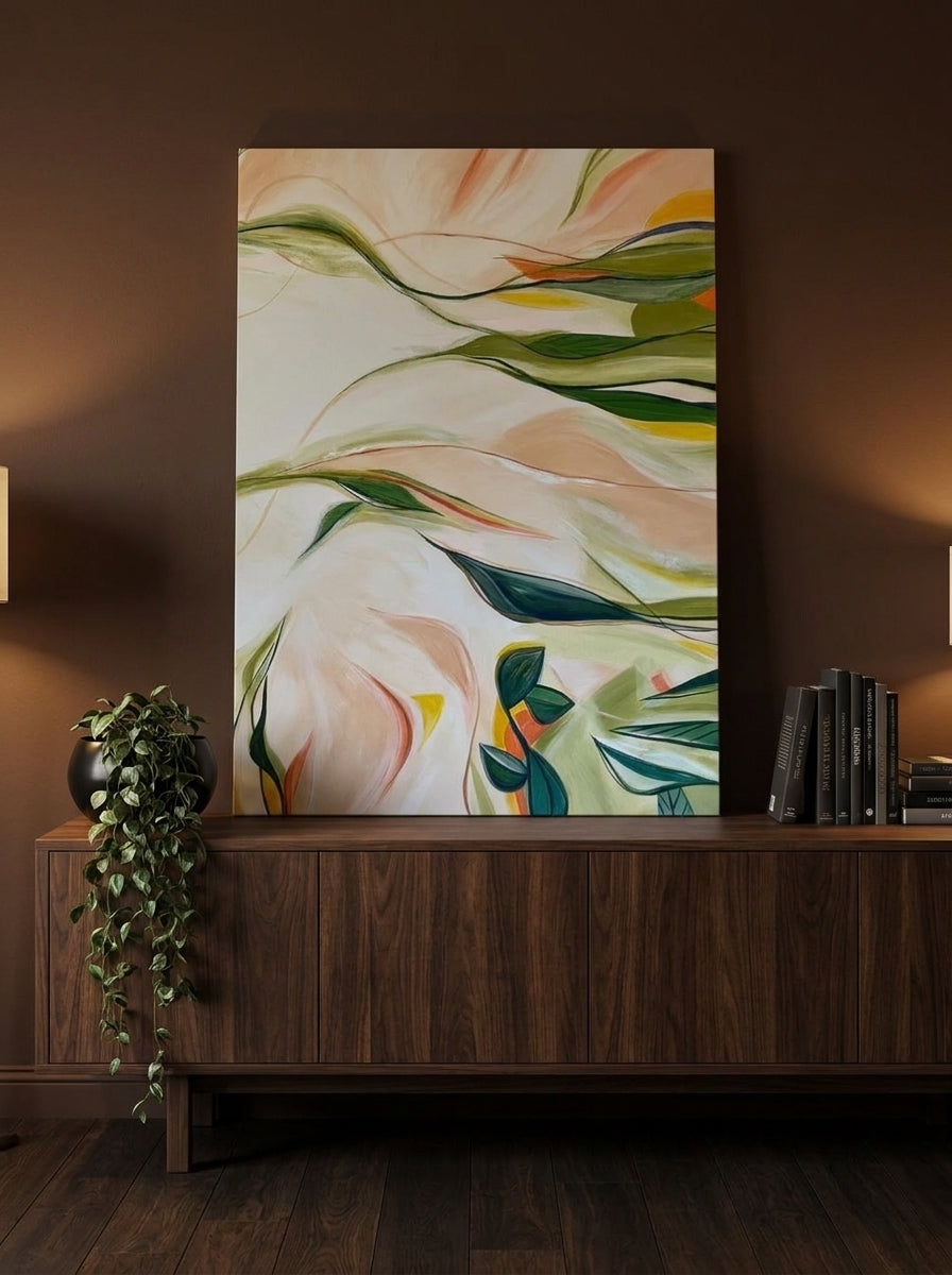 Stretched canvas wall art standing on a sideboard in a moody dining room