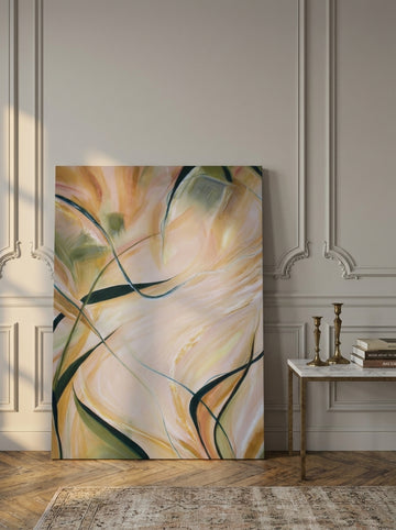Stretched canvas wall art leaning against the wall in a Parisian home office