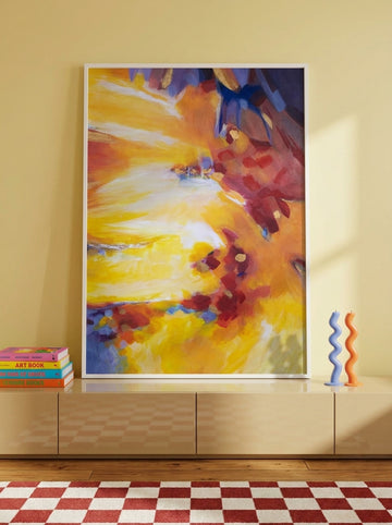 Modern wall art print standing on a sideboard in a colourful eclectic home office
