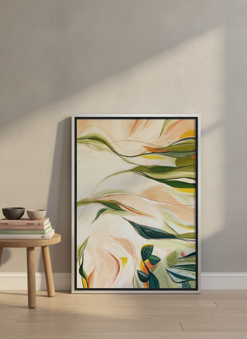 Canvas wall art with a silver leaf surround leaning against the wall in a warm Japandi home office