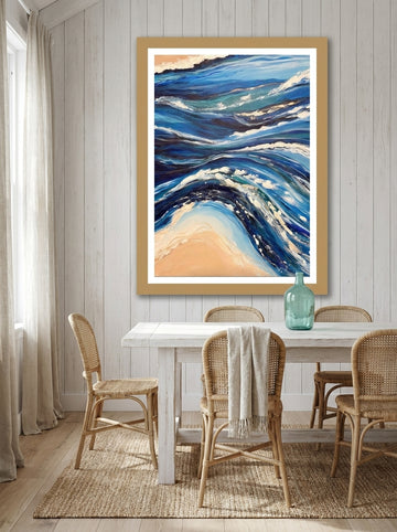 Modern wall art print styled on the wall in a coastal dining room