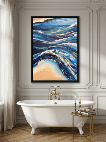 Canvas wall art with a black surround styled on the wall in a Parisian bathroom