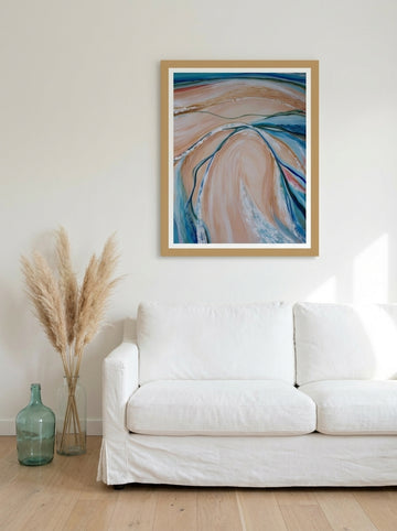 Modern wall art print styled on the wall in a coastal living room