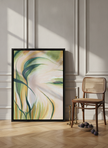 Canvas wall art with a black surround leaning against the wall in a Parisian living room