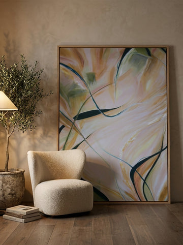Oversized statement modern wall art print leaning against the wall in a luxe bedroom