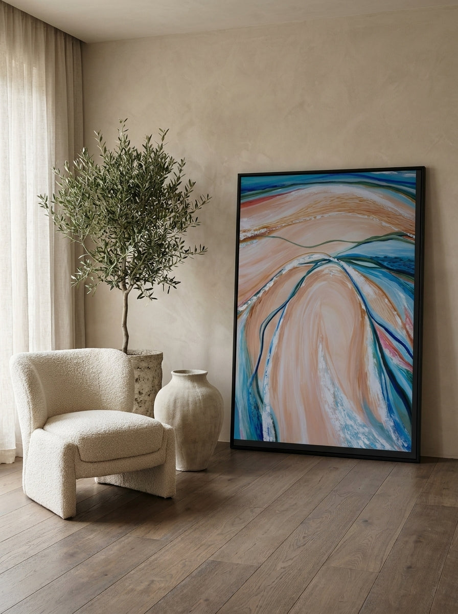 Oversized statement modern wall art print leaning against the wall in a luxe dining room