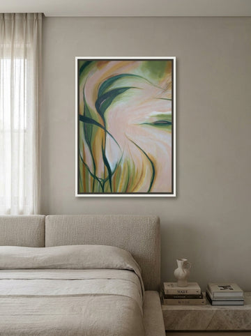 Canvas wall art with a white surround styled on the wall in a luxe bedroom