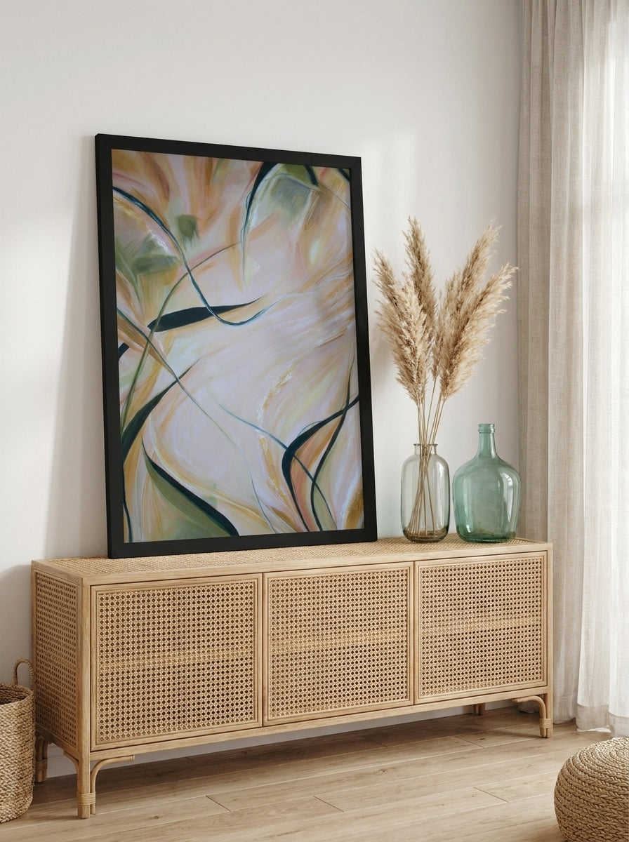 Modern wall art print standing on a sideboard in a coastal living room