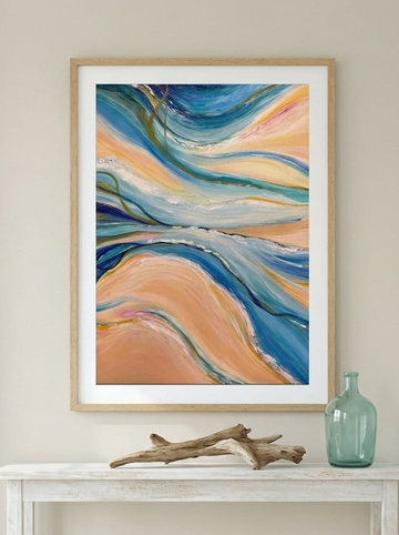 Modern wall art print styled on the wall in a coastal living room