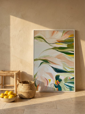 Oversized statement modern wall art print leaning against the wall in a Mediterranean dining room