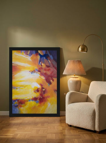 Modern wall art print leaning against the wall in a mid-century bedroom